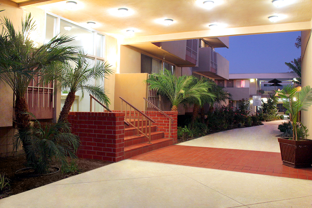 This image displays the apartment entrance photo for Anza Management Company client services.